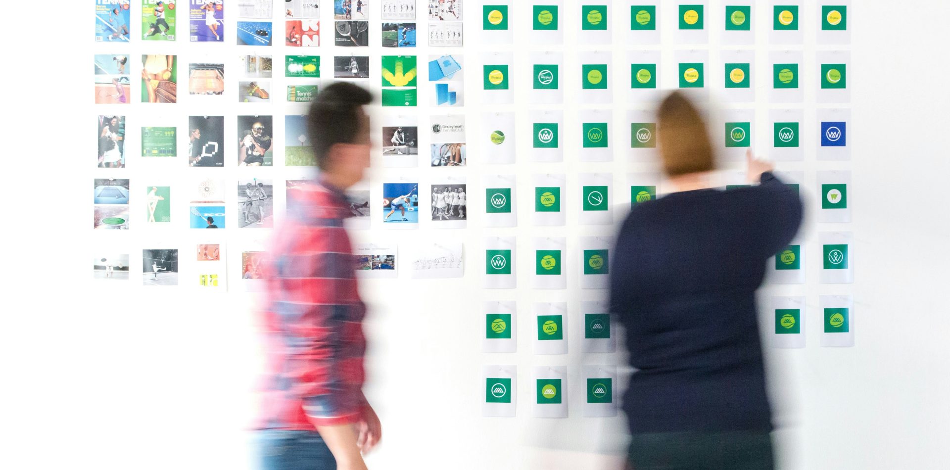 Useful Brand Guidelines: What Teams Actually Need, Minimal Creative team reviewing useful brand guidelines and visual identity materials
